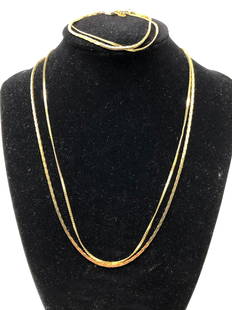 Vintage Ambassador Gold Tone Jewelry: Description: Vintage collection of two necklaces with matching bracelets from Ambassador. Elegant gold tone chains in 2 patterns; inscribed hallmark tag with manufacturers name by closures. Four