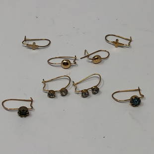 Wire Earring Collection: Description: Eclectic set of wire-style pierced earrings including: two pairs with stones, one pair with gold tone balls, and one with tiny crosses. Four pairs in total. Great opportunity to round