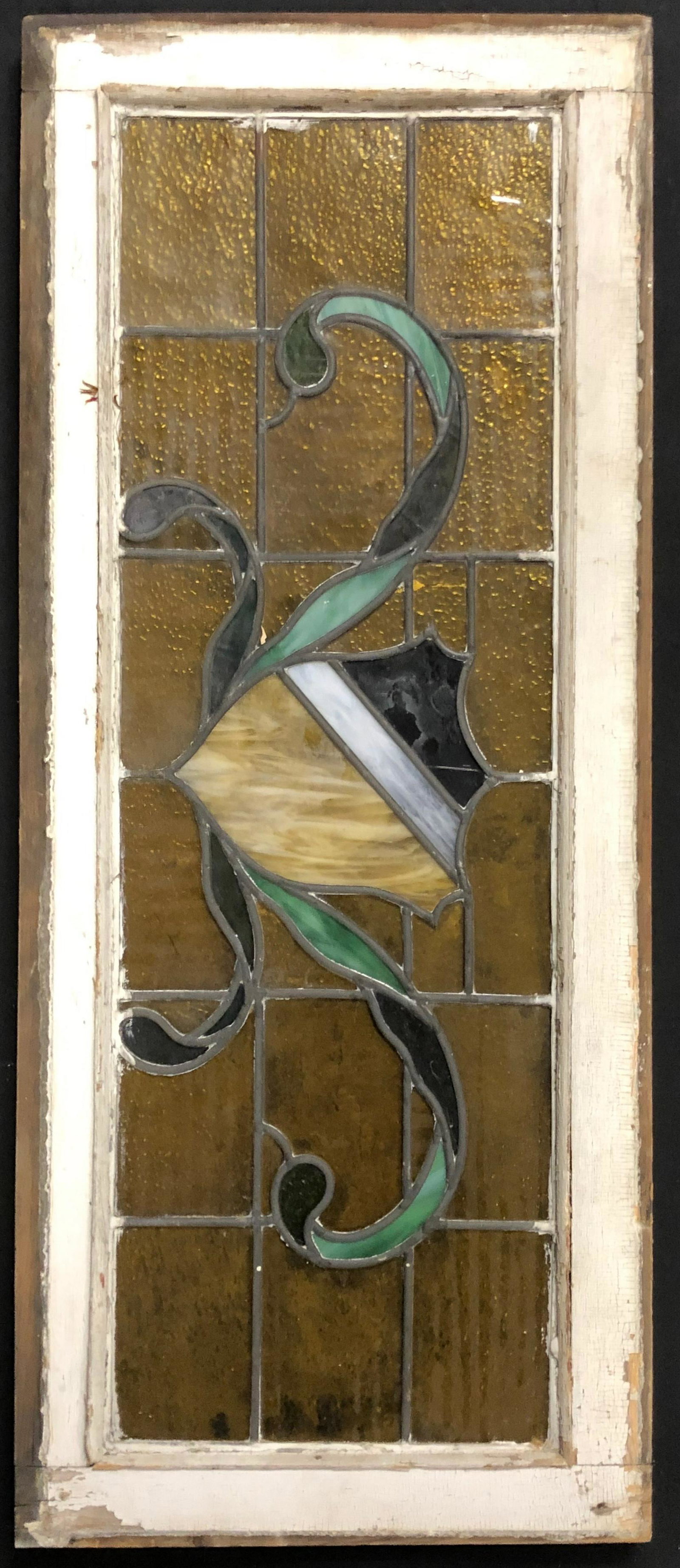 Antique vertical stained glass in wooden frame: Description: Stained glass window depiction of a strolling abstract duck; Heavy dark wood frame measures 15" x 36"; glass 10" x 32" all measurements approximate. Shipping cost: $100. Different rate to