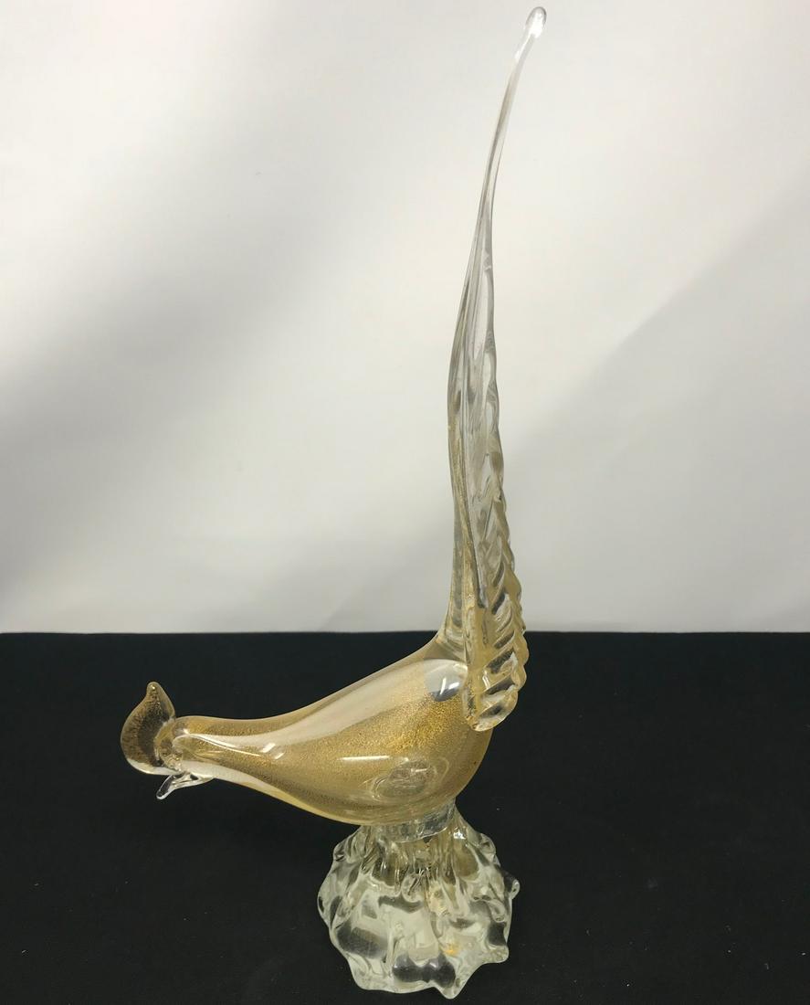Murano Glass Bird, Gold Speckled: Description: Murano, glass bird, body clear with fine gold colored dust mixed in, tail straight up; 13" high, 6" wide ; all measurements are approximate; Shipping cost: $25. Different rate to Californ