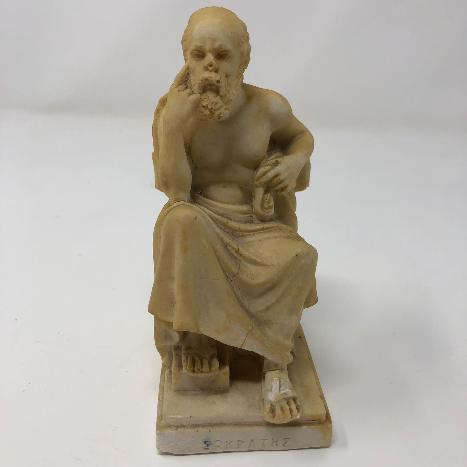 Greek statue, robed philosopher in chair, contemplating (1 of 5)