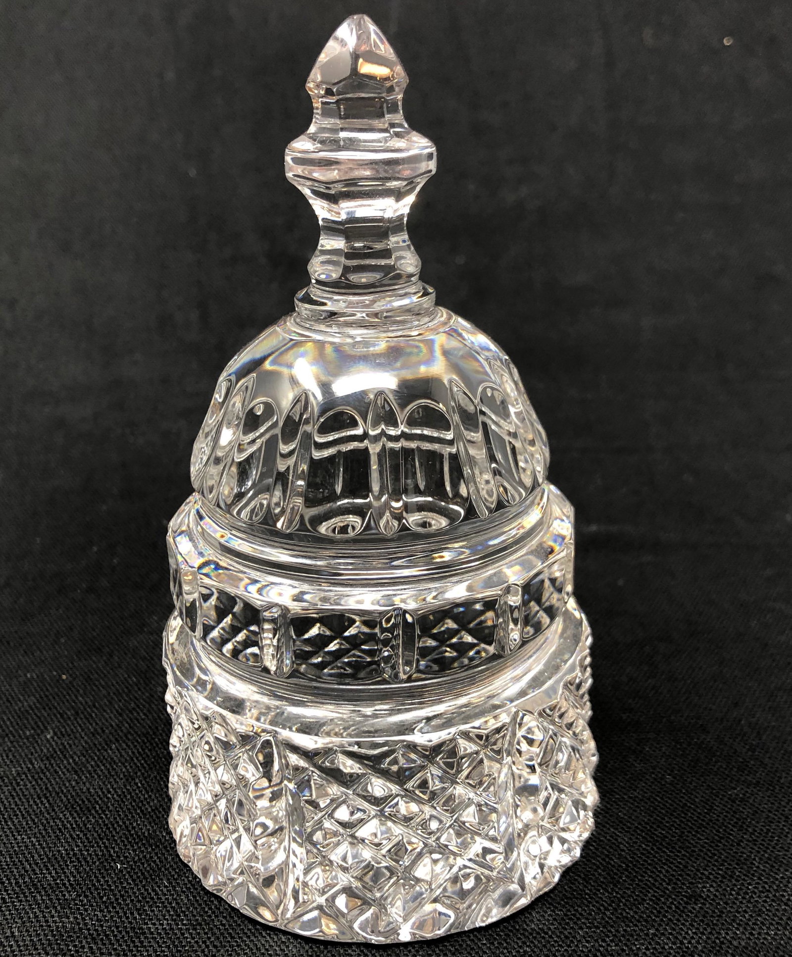 WATERFORD; Clear glass bell shape, solid, no ringer: WATERFORD; Clear glass bell shape, solid, no ringer; 6in x 3in approx meas. Shipping cost: $17. Different rate to California, Alaska, Hawaii and all international may apply.RESERVE: $14
