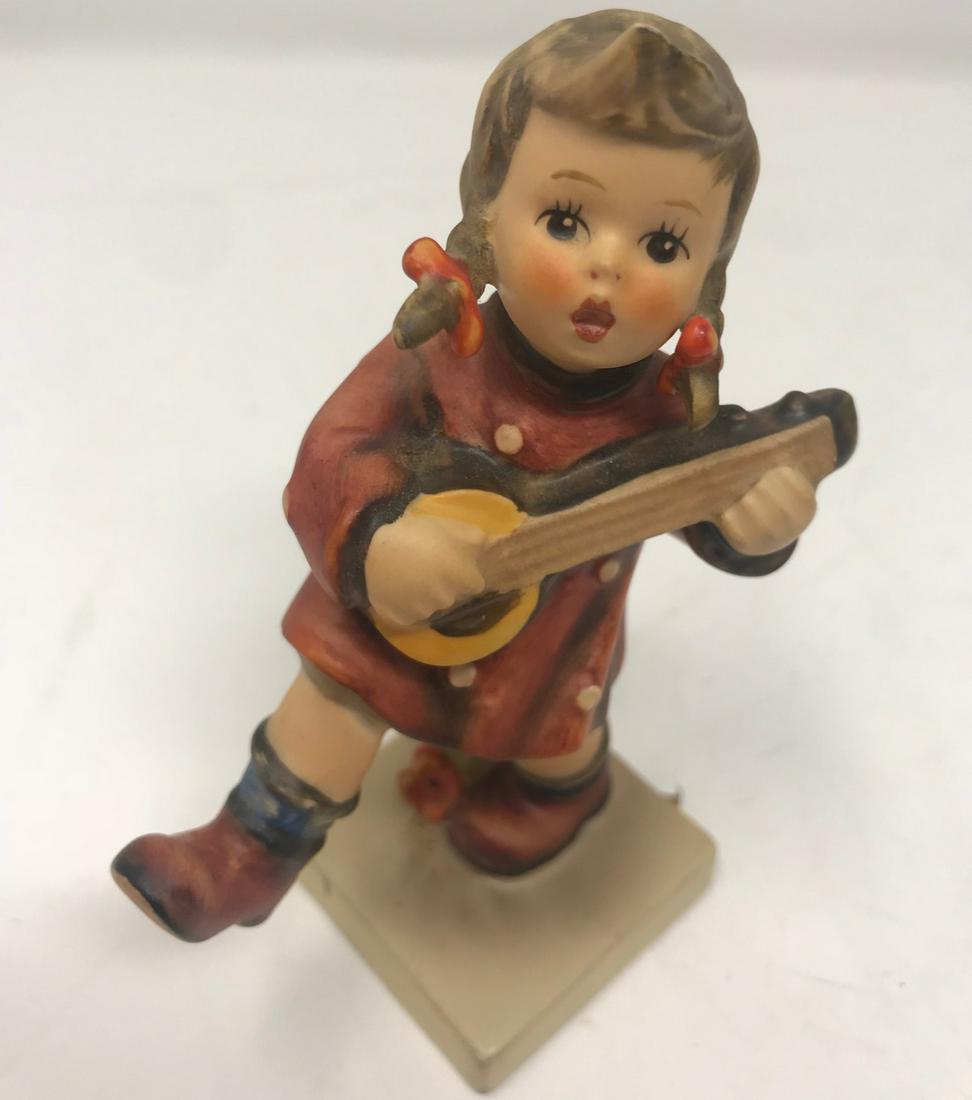 Vintage Goebel Hummel # 86, Happiness: Description: Vintage Goebel Hummel porcelain figuring #86, aptly named "Happiness." This cunning, smaller sized figurine is stamped with TMK-3, known as the Stylized Bee, circa 1960-1972. Retains orig