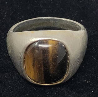 2 Tone BrownStone Men's Pinkie Ring: 2 Tone BrownStone Men's Pinkie RingApproximate measurements: 1 inch diameter;Materials: silver tone metal, gold tone metal, brown stone;Condition: used, good;Shipping cost: $12. Different rate to