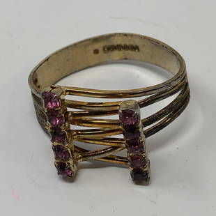 Squeezy slip on / expandable 4 wire ring w 10 tiny: Squeezy slip on / expandable 4 wire ring w 10 tiny square pinkstones criss crossed x 7 strands in center, gold gilt, just lovely vintage delicate pieceApproximate measurements: 1 x 1 x 0.5