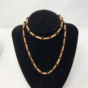 Pretty chocolate chippy color 3 plates spaced by 1/2": Pretty chocolate chippy color 3 plates spaced by 1/2" tanpipesApproximate measurements: 27 inches total length ;Materials: Beads;Condition: used, good;Shipping cost: $12. Different rate to