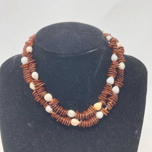 Brown plate discs & white nutshelly beads necklace #2: Brown plate discs & white nutshelly beads necklace #2Approximate measurements: 28 inches;Materials: Wood or plastique;Condition: used, good;Shipping cost: $12. Different rate to California, Alaska,