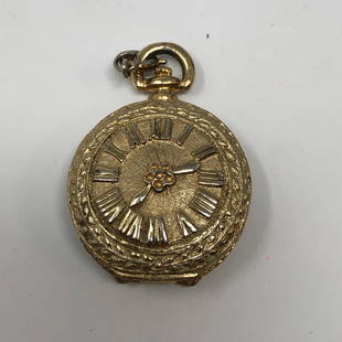 CHARVAIX women's gold pocket watch;: CHARVAIX women's gold pocket watch; Approximate measurements: 1.33 x 1.33 round x 0.5 depth, inches to 2 inches total height including top rings; ;Materials: metal, glass; ;Condition: used,
