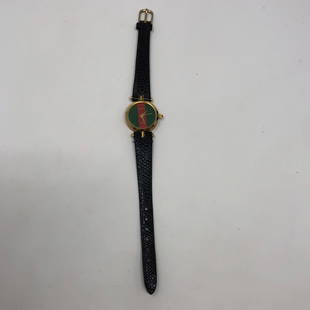 GUCCI ladies RED GREEN face colors gorgeous black: GUCCI ladies RED GREEN face colors gorgeous black leather band black gold logo on backApproximate measurements: 7.75 band length inches, face 0.75 inch round;Materials: metal, glass