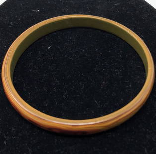 Faux wood Brown Bangle: Faux wood Brown BangleApproximate measurements: 3 inches round;Materials: wood & or plastic;Condition: used, good;Shipping cost: $12. Different rate to California, Alaska, Hawaii and all