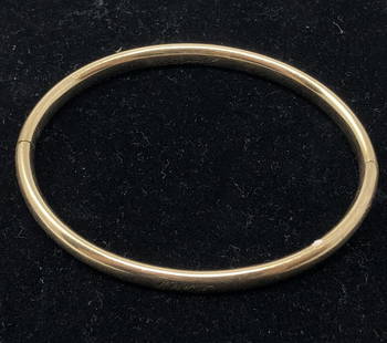 3x2 Gold tone Bracelet engraved June2871? F.M.?see: 3x2 Gold tone Bracelet engraved June2871? F.M.?see photosApproximate measurements: 3 x 2 inches;Materials: metal, possible gold plate, possible plastic;Condition: used, good;Shipping cost: $12.