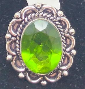 German Silver Ring w/ Peridot: Description: German Silver Ring w/ Peridot. Shipping: $5
