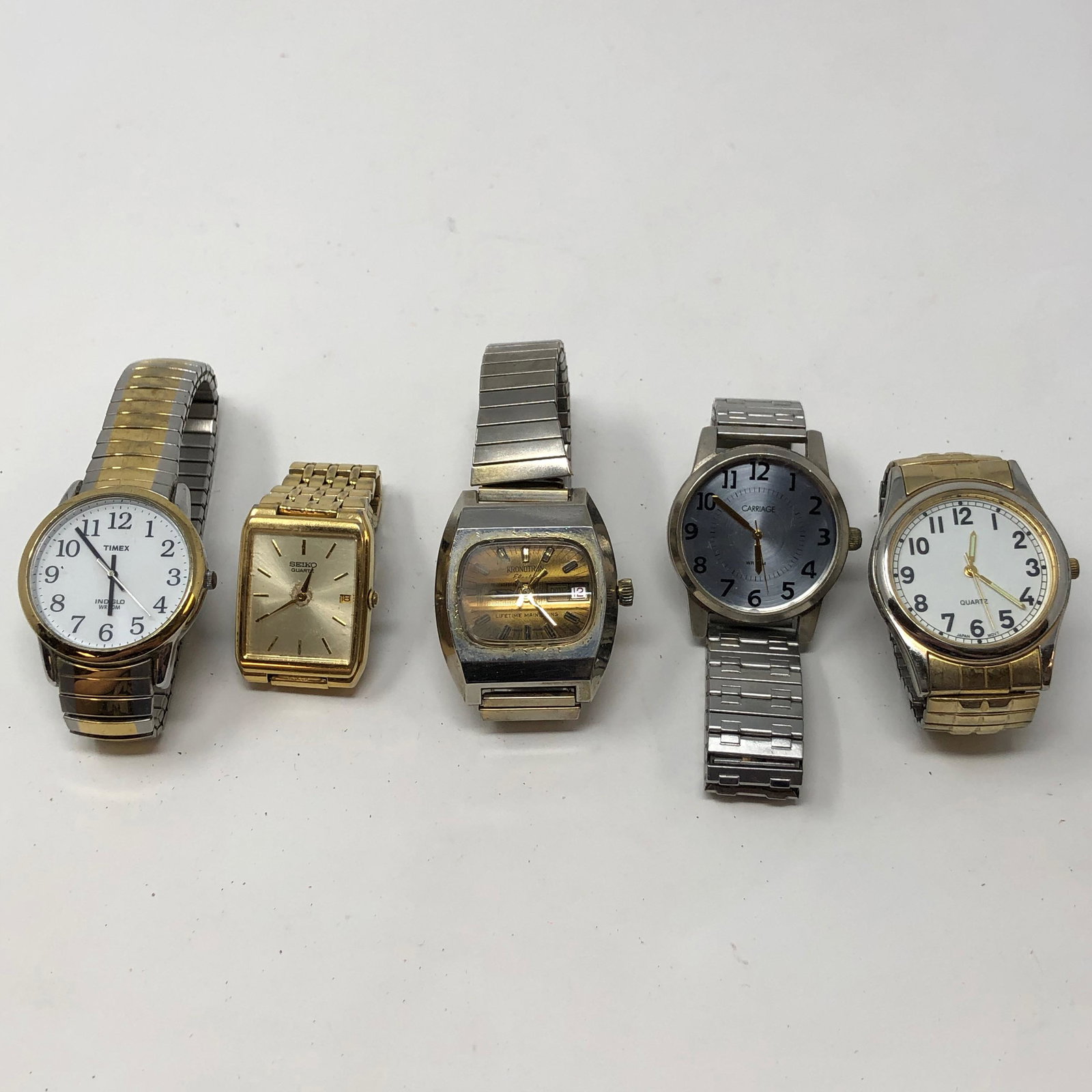 LOT (5) FIVE MENS WATCHES, Timex, Seiko see photos: LOT (5) FIVE MENS WATCHES, Timex, Seiko see photosApproximate measurements: varies watchband + watch;Materials: variable, metal, glass, quartz, stones;Condition: used, good;Shipping cost: $12. Differe