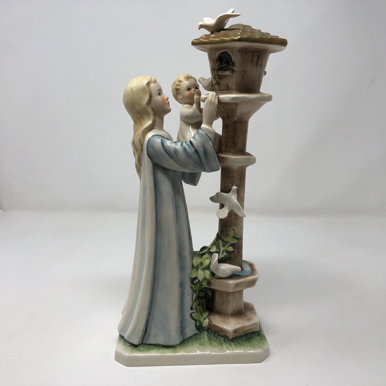 Goebel Charlot BYJ 57 'Madonna of the Doves' TMK 3 1957: Description: Goebel Charlot BYJ 57 'Madonna of the Doves' TMK 3 1957. Measurements; 10.75 H * 3.5 W * 3 D. Material: Porcelain.