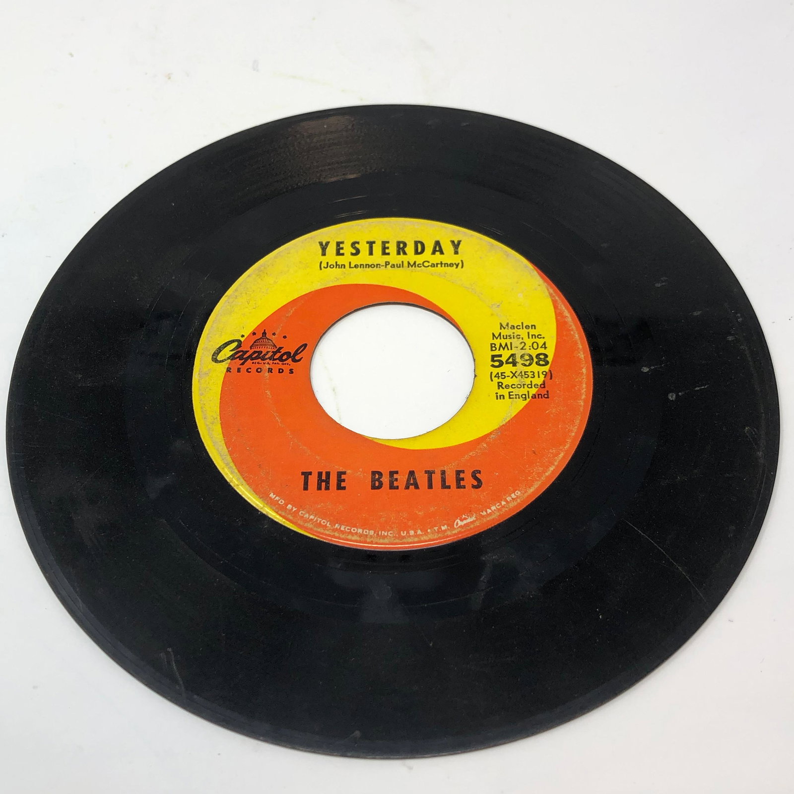 BEATLES CAPITOL RECORDS VINYL 45 / YESTERDAY / ACT: BEATLES CAPITOL RECORDS VINYL 45 / YESTERDAY / ACT NATURALLYApproximate measurements: 7 inches round Materials: vinyl, paperShipping cost: $7. Different rate to California, Alaska, Hawaii and all Inte