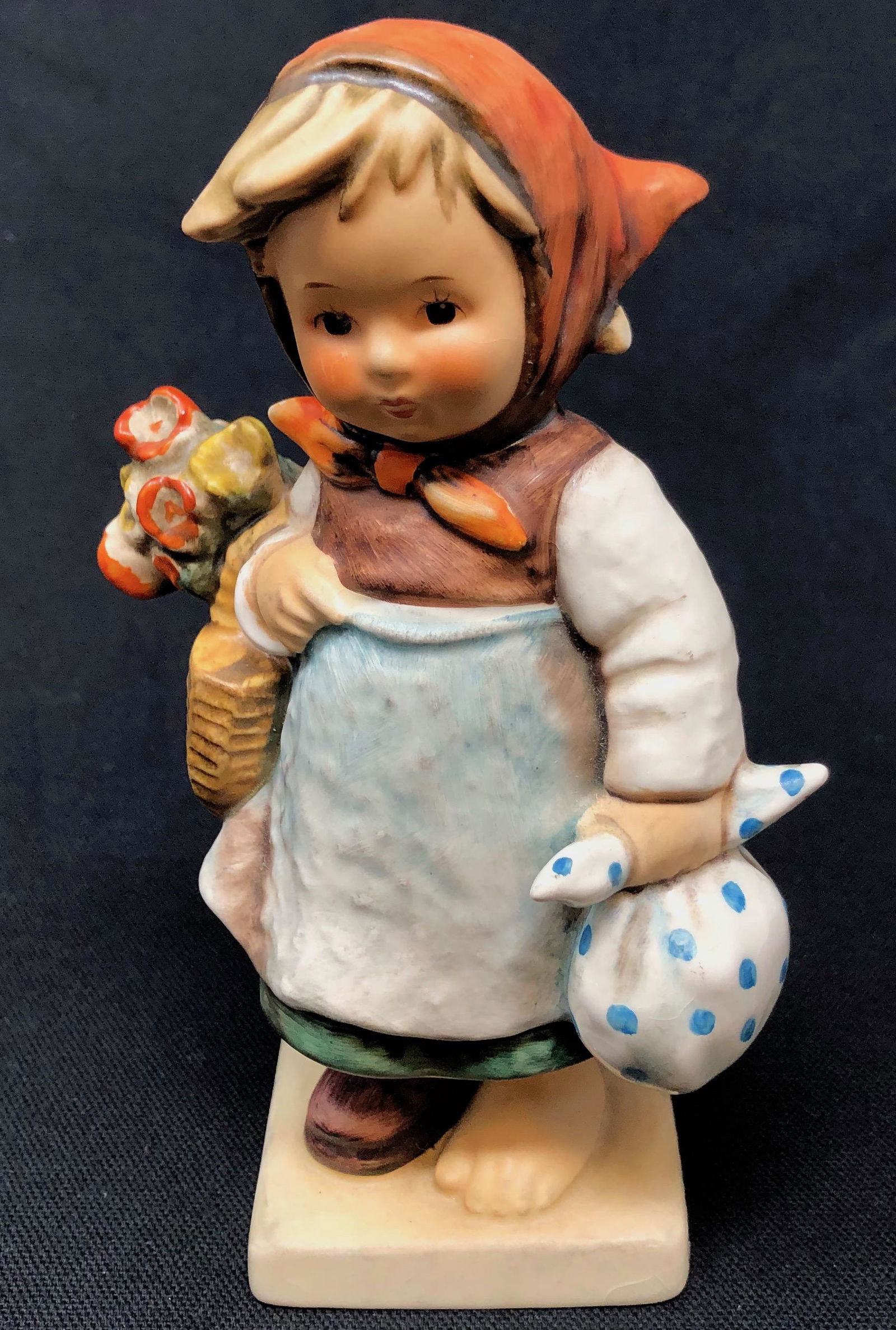 GOEBEL Hummel Weary Wanderer 204 W Germany: GOEBEL Hummel Weary Wanderer 204. Marked on bottom in blue Goebel W GERMANY 204. Approximate measurements: 5.75 x 3.5 x 2.25 inches. Materials: Porcelain. Shipping: $12. Different rate to California,