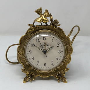 Vintage gold plate MATSON clock electric WORKING: Vintage gold plate MATSON clock K803 electric WORKING, mid-century, luminous dial, note glass face has scratches see photos. Approximate measurements: 6 x 4.25 x 3 inches. Materials: metal,