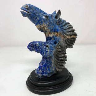 Hand carved Lapis Lazuli blue white horses figurine: Hand carved Lapis Lazuli blue white horses figurine. Approximate measurements: 8 x 4 x 5 inches. Materials: Carved polished Lapis Lazuli gemstone, black stone. Shipping cost: $17. Different rate to