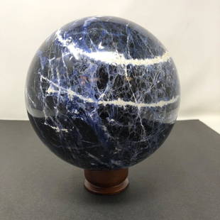 Lapis Lazuli Blue White Swirl Hand Carved Globe on base: Lapis Lazuli Blue White Swirl Hand Carved Globe on base. Approximate measurements: 8 x 7 x 7 inches. Materials: Marble, wood. Shipping cost: $35. Different rate to California, Alaska, Hawaii and