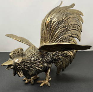 Golden ROOSTER Statue: Golden ROOSTER Statue. Approximate measurements: 11 L x 11.5 x 8 inches. Materials: Gold tone brushed cast iron. Shipping cost: $20. Different rate to California, Alaska, Hawaii and all International