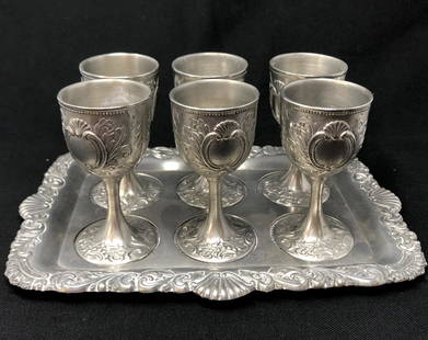 OXFORD HALL PEWTER Glasses/Tray Service (6): OXFORD HALL PEWTER Glasses/Tray Service (6). Approximate measurements: total: 9 x 6.5 x 3.75 inches. Glasses: 3.5 inches H each of 6. Materials: Pewter. Shipping cost: $15. Different rate to