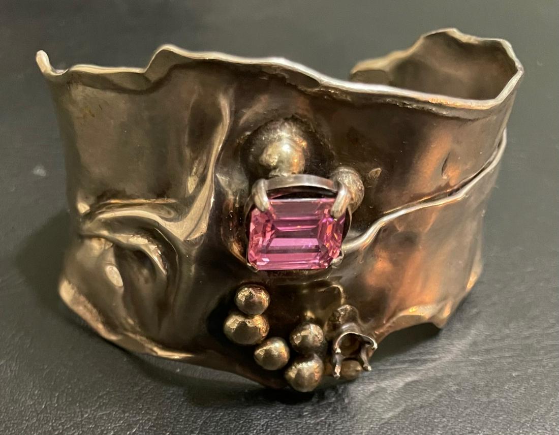Elegant Gem stones floral silver Bareli Bangle: Description: Elegant Gem stone floral silver Bareli Bangle (Pink zircon) Measurement approximate: 3 Inches wideMaterial: silver / Pink Shipping cost: $10