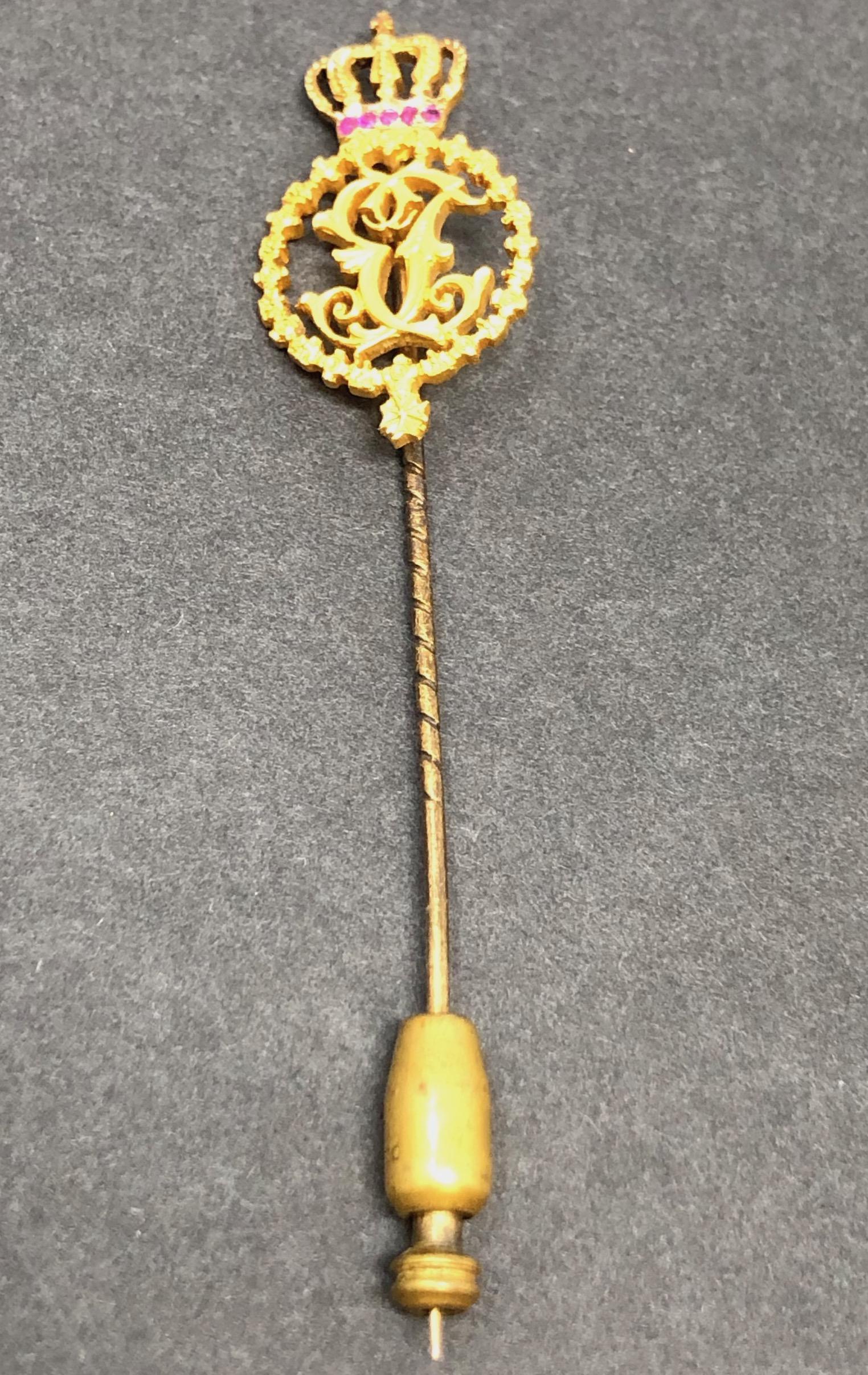 3 inch Redstone Crown Crest Stick / Hat Pin: Description: 3 inch Redstone Crown Crest Stick / Hat Pin Approximate measurements: 3 x 0.5 inches Materials: Red clear stones, gold toned, brass toned metal. Shipping cost: $7. Different rate to Calif