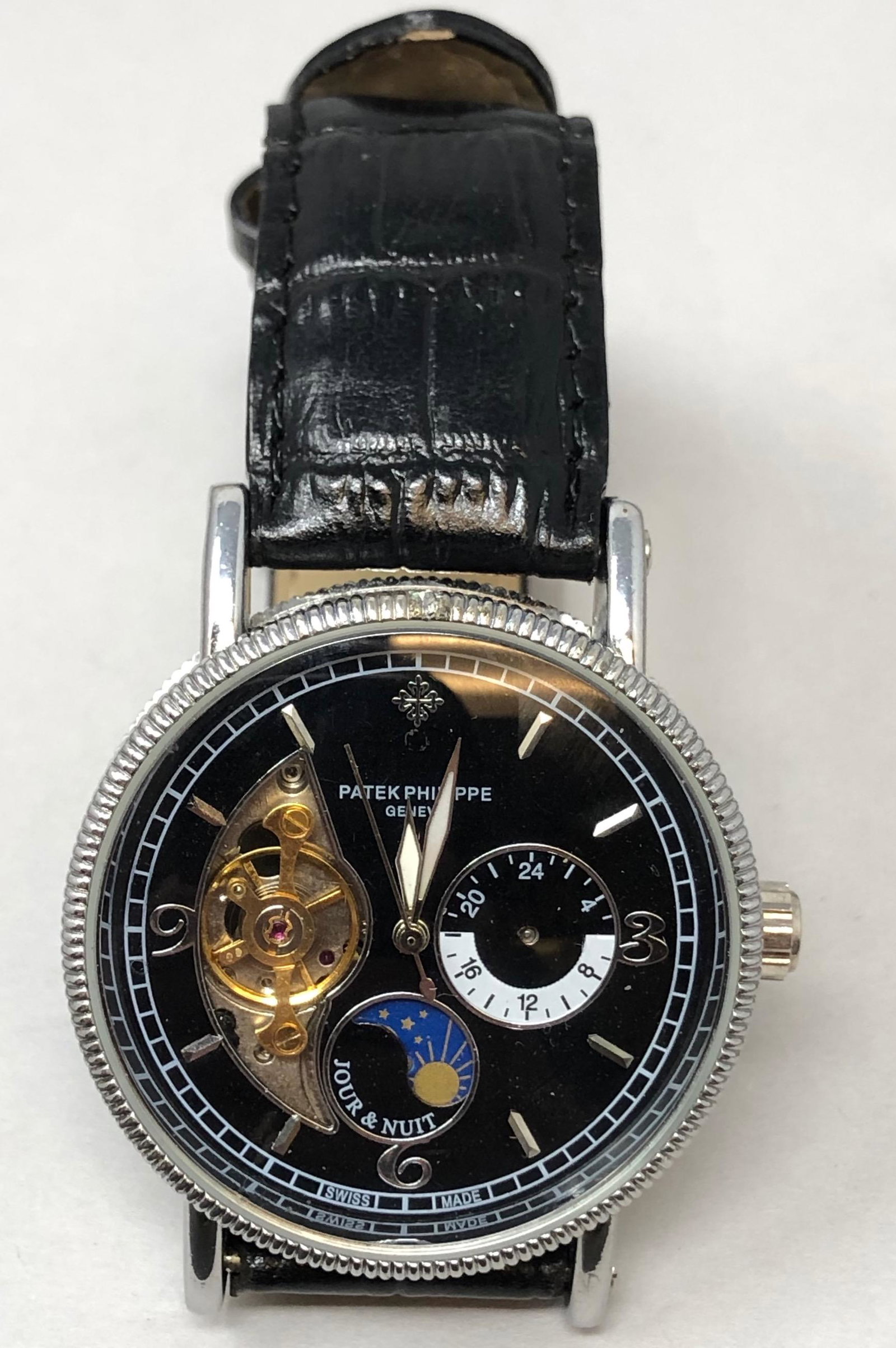 PATEK PHILIPPE Geneve Stainless Steel Chrono.Quartz: Description: PATEK PHILIPPE Geneve Stainless Steel Chrono.Quartz 3ATMApproximate measurements: 1 5/8 face x 10 inches total length Materials: Genuine leather, stainless steel, quartz Shipping cost: $9