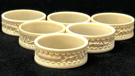 Antique BONE Silverware Napkin Holder Ring Set (6) #2: Antique BONE Silverware Napkin Holder Ring Set (6) #2. Ornately carved animal bone rings. Approximate measurements: 2 inches diameter each. Materials: Animal Bone.