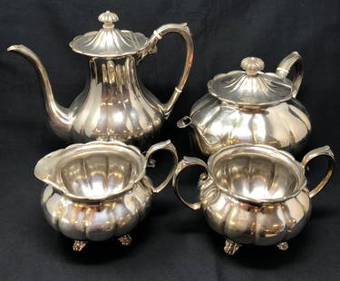 Antique SHEFFIELD Silver Tea Set: Antique SHEFFIELD Silver Tea Set w/ Bone fittings, Teapot, Coffeepot, sugar bowl and creamer. Approximate measurements: Teapot: 12 x 6.5 x 6.5 inches. Coffeepot: 9 x 10 x 6 inches. Sugar Bowl: 4.5