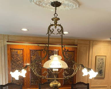 Antique Bronze Chandlier: Antique Bronze Chandlier. Approximate measurements: 43 x 39 x 15 inches. Materials: Bronze.