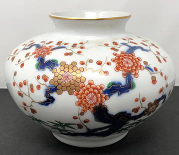 Handpainted Porcelain Gold Trim KOREAN Vase: Handpainted Porcelain Gold Trim KOREAN Vase. Stamped on bottom. 5.5 H x 7.5 inches round. Materials: Porcelain, gold gilt.