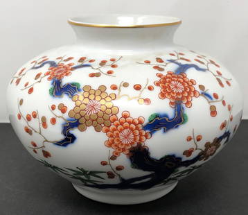 Handpainted Porcelain Gold Trim KOREAN Vase: Handpainted Porcelain Gold Trim KOREAN Vase. Stamped on bottom. 5.5 H x 7.5 inches round. Materials: Porcelain, gold gilt.