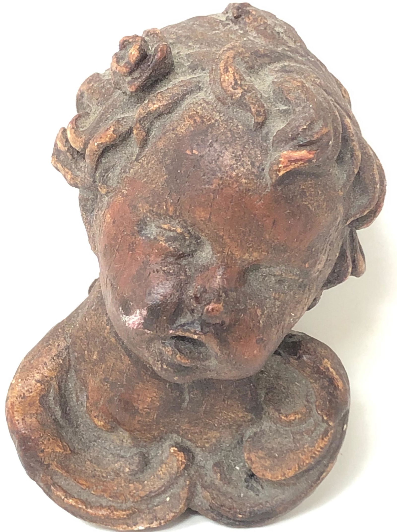 Antique Cherub face statue (1 of 2)