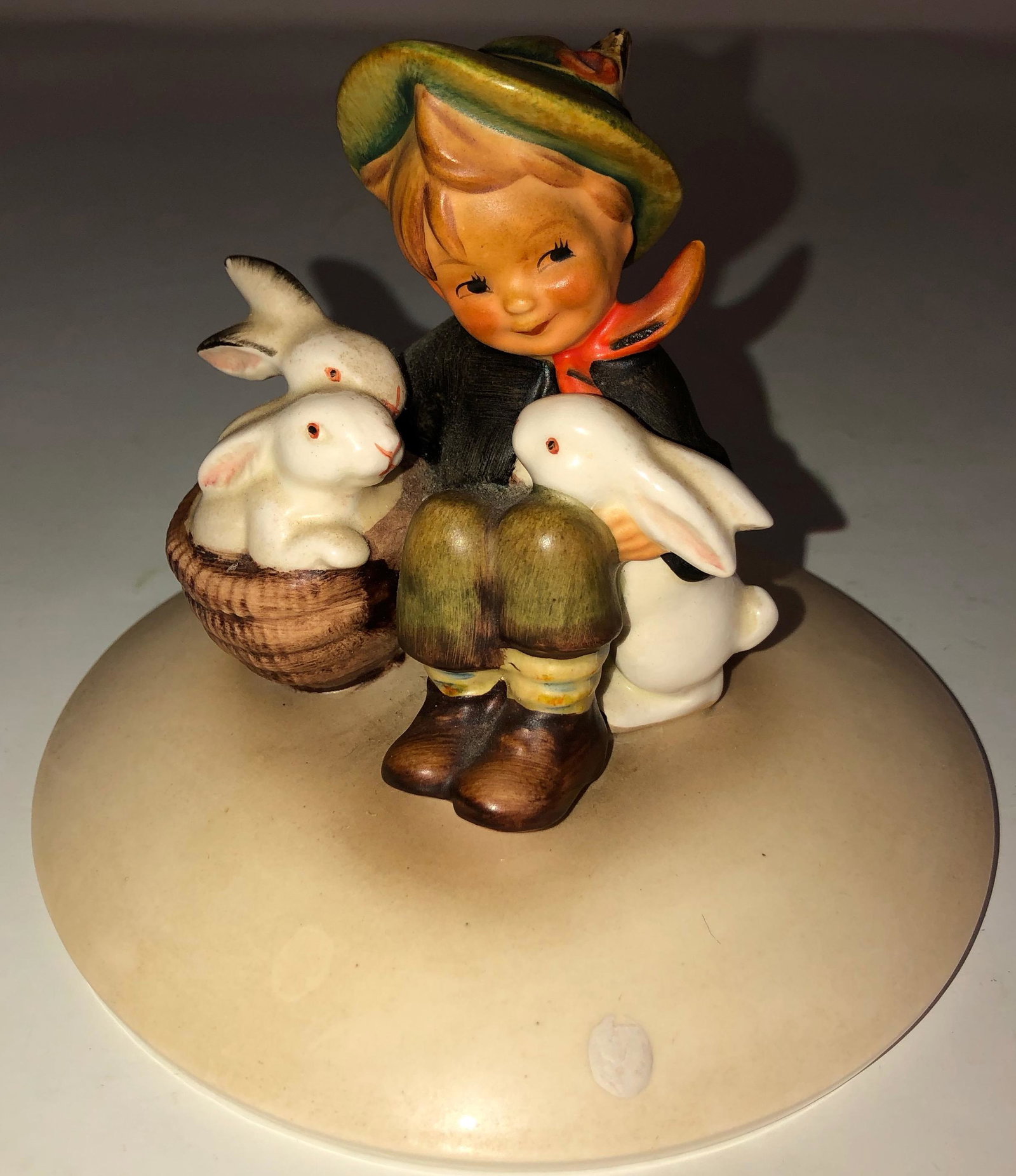 HUMMEL PLAYMATES Hares / Bunnies III/58: Description: HUMMEL PLAYMATES Hares / Bunnies III/58, stamped on bottom III/58 Approximate . Measurements: 4 H x 5.5 round at base inches. Materials: porcelain.