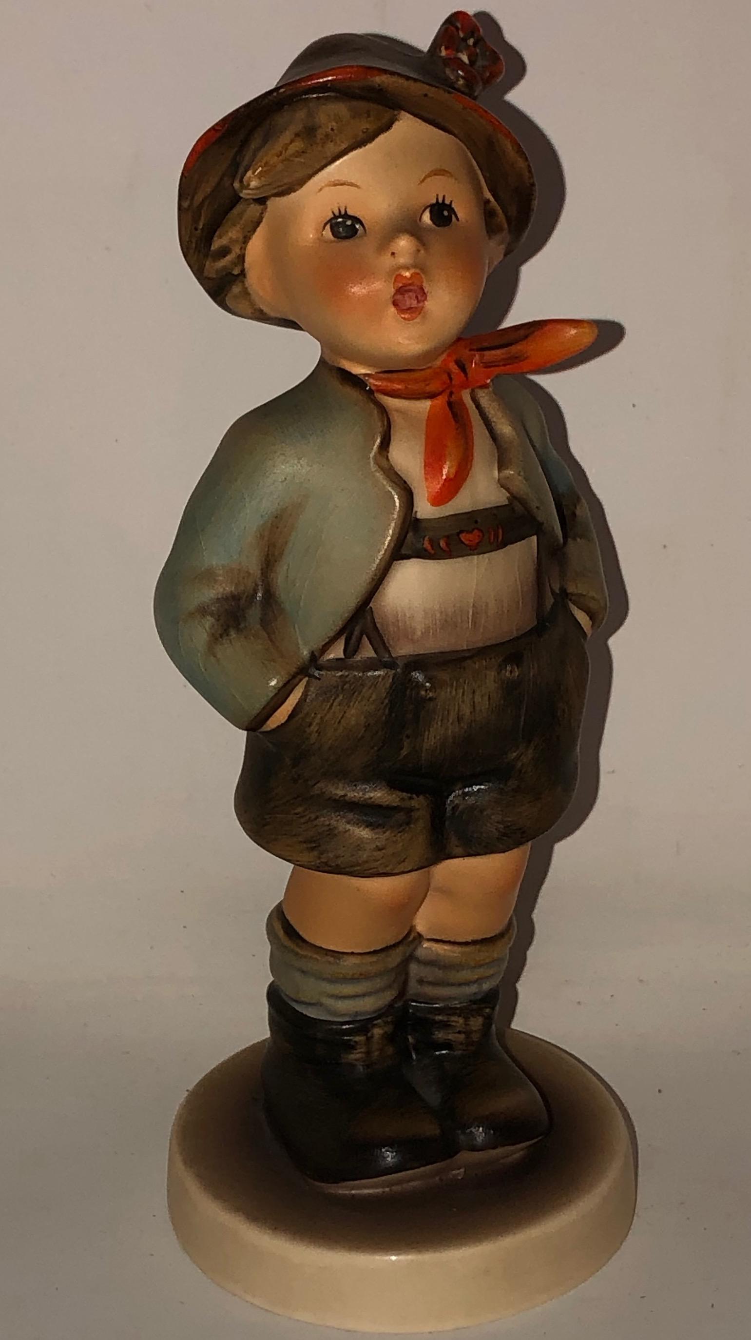 GOEBEL HUMMEL Lederhosen W GERMANY 95 40 signed: Description: GOEBEL HUMMEL Lederhosen W GERMANY 95 40 signed, see bottom for markings. Approximate . Measurements: 5.5 x 2.5 x 2.5 inches. Materials: porcelain.