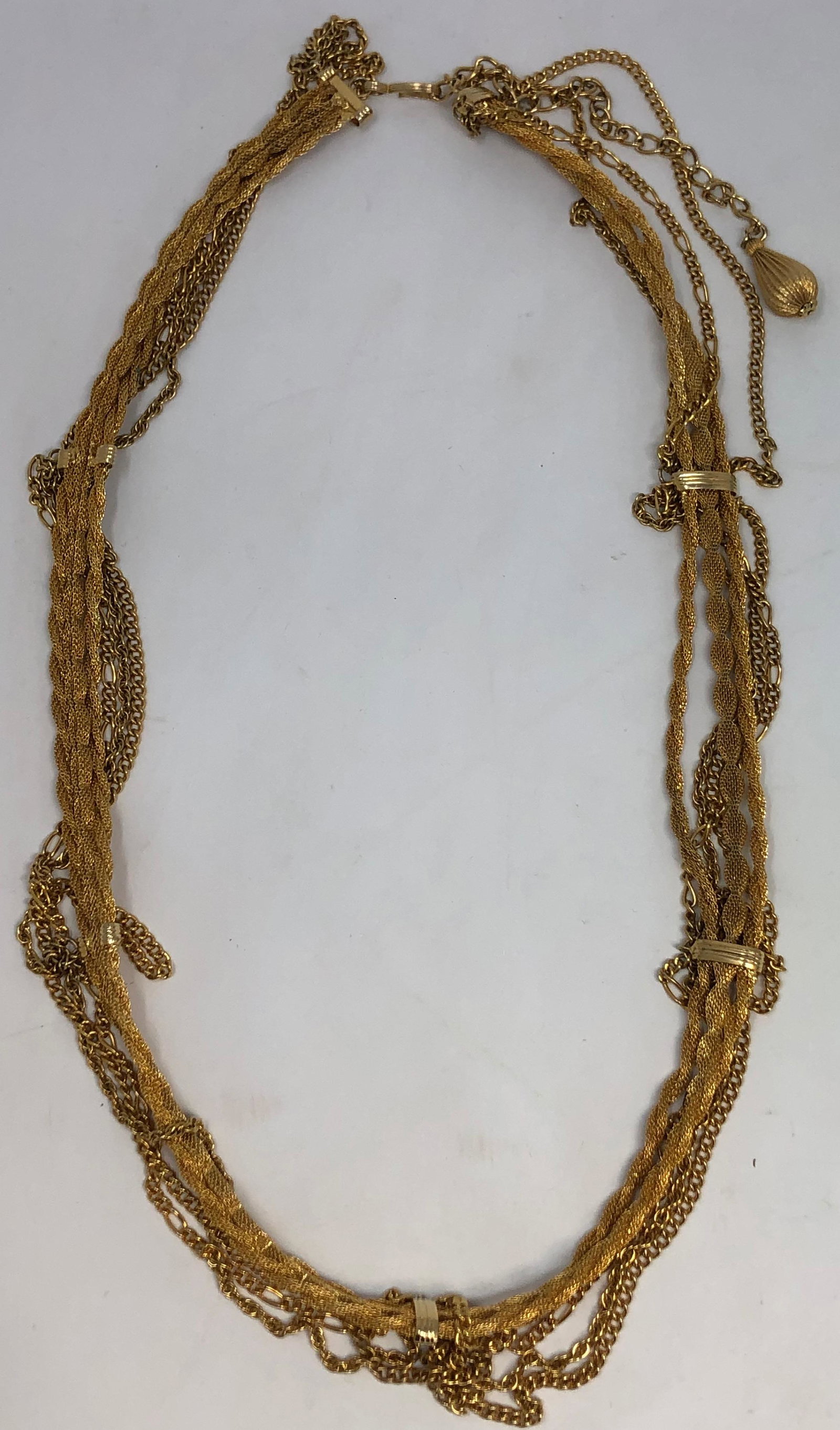 Elegant Vintage Alice Caviness multi twisted gilt necklace: Description: Elegant Vintage Alice Caviness multi twisted gilt necklace . Measurement approximate: 30"l Material: Gilt. This item has a reserve price.