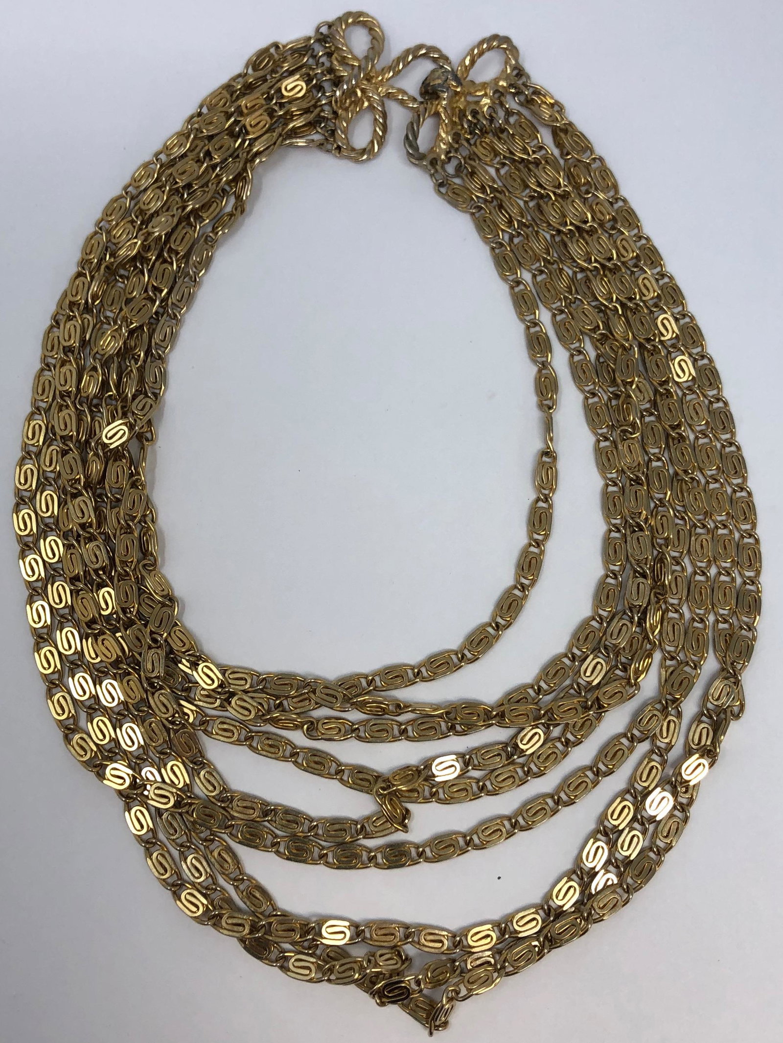 Elegant Vintage Alice Caviness multi-layer gilt necklace: Description: Elegant Vintage Alice Caviness multi-layer gilt necklace . Measurement approximate: 18"l Material: Gilt/ Semi â€“ Precious stone. This item has a reserve price.