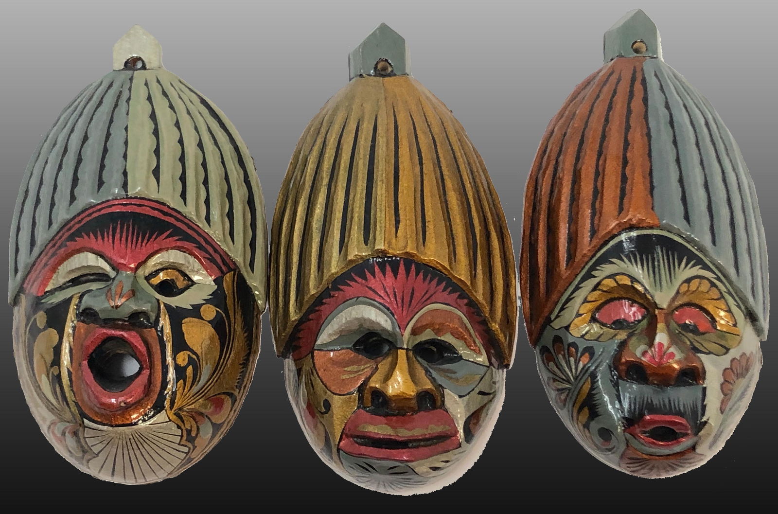 Three small Peruvian hand painted masks (1 of 8)
