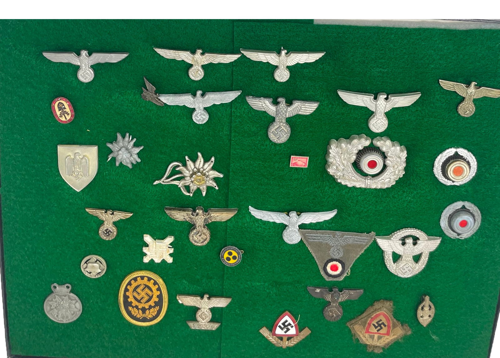 A wide selection of WWII German Pins, insignia, patches and more (1 of 6)