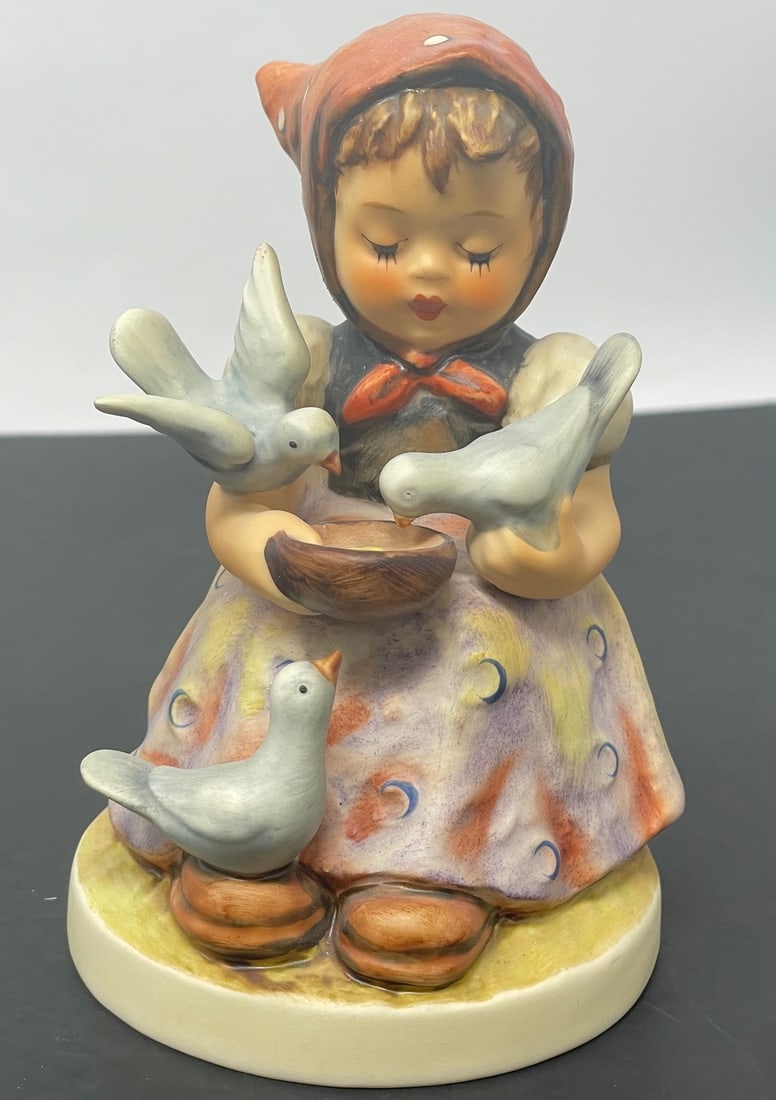 Goebel Hummel Figurine "Cinderella" #337: Description: Goebel Hummel Figurine "Cinderella" #337; measurement approximate: 4"h; material: porcelain