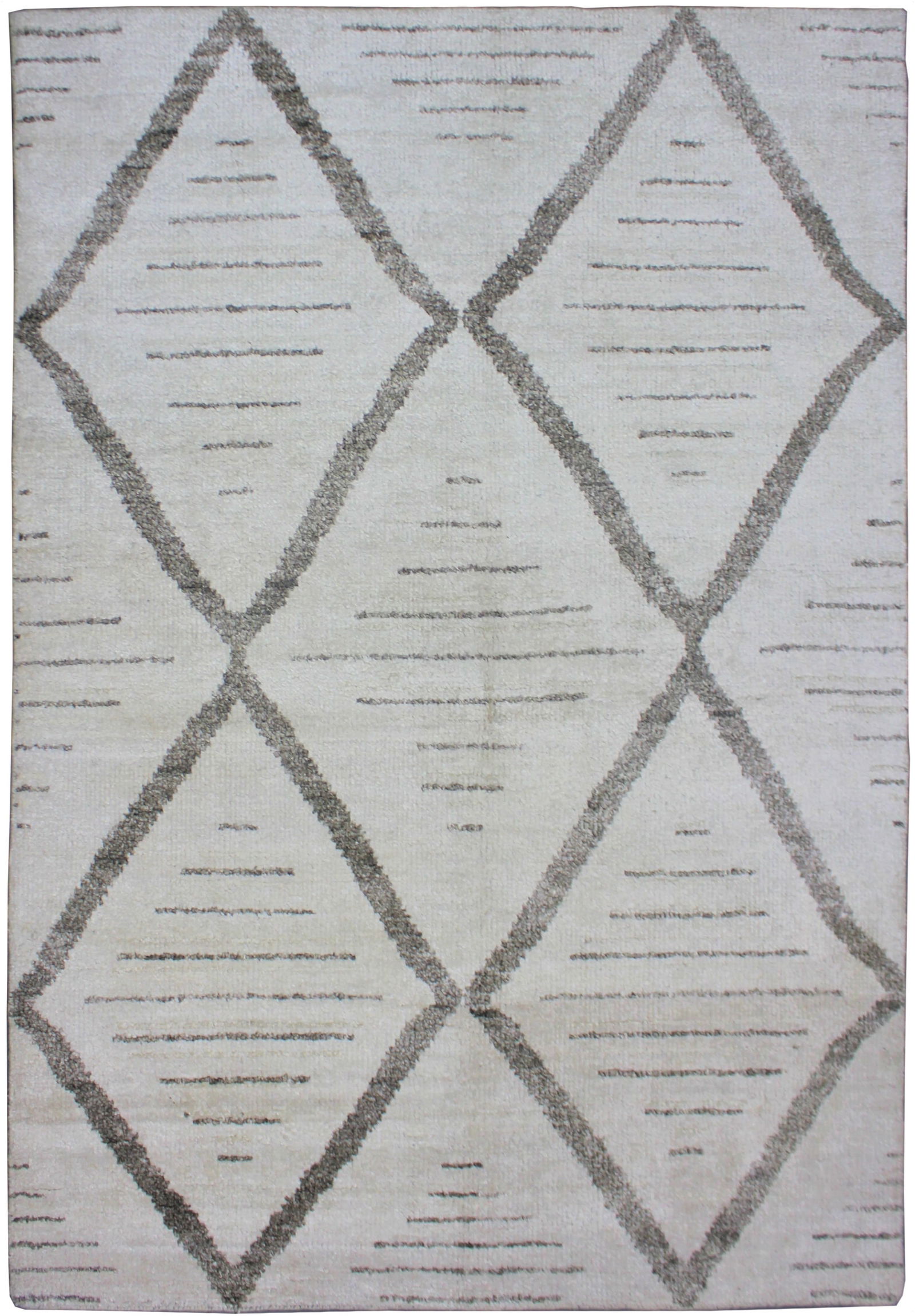 Handmade Bamboo Silk Rug. 8'x10": A beautiful handmade environmentally friendly Bamboo and silk rug, with a geometric design is made of 75% bamboo silk and 25% cotton. The outstanding design, and very popular colors make this piece an