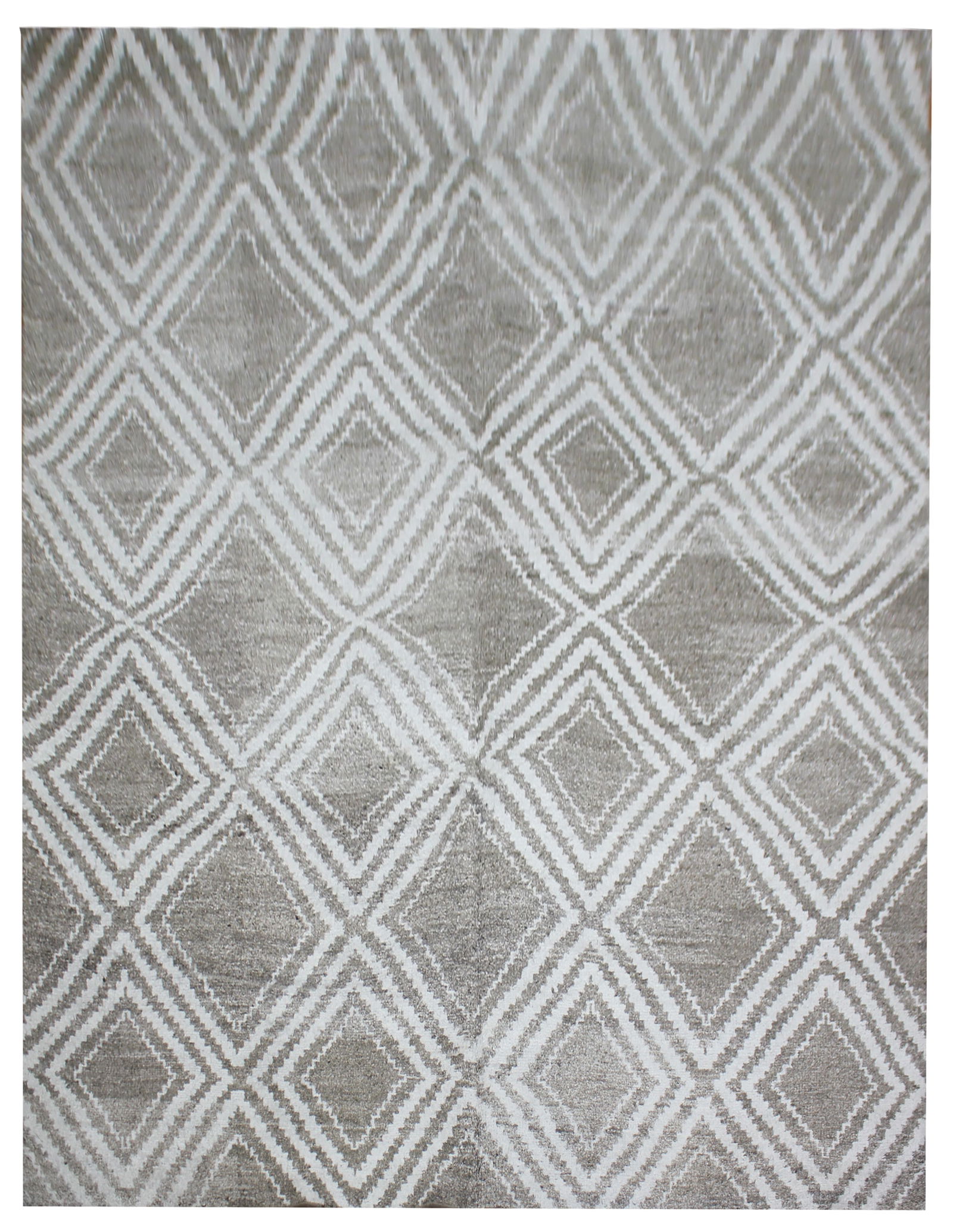 Handmade Bamboo Silk Rug. 9/12': A beautiful handmade environmentally friendly Bamboo and silk rug, with a geometric design is made of 75% bamboo silk and 25% cotton. The outstanding design, and very popular colors make this piece an