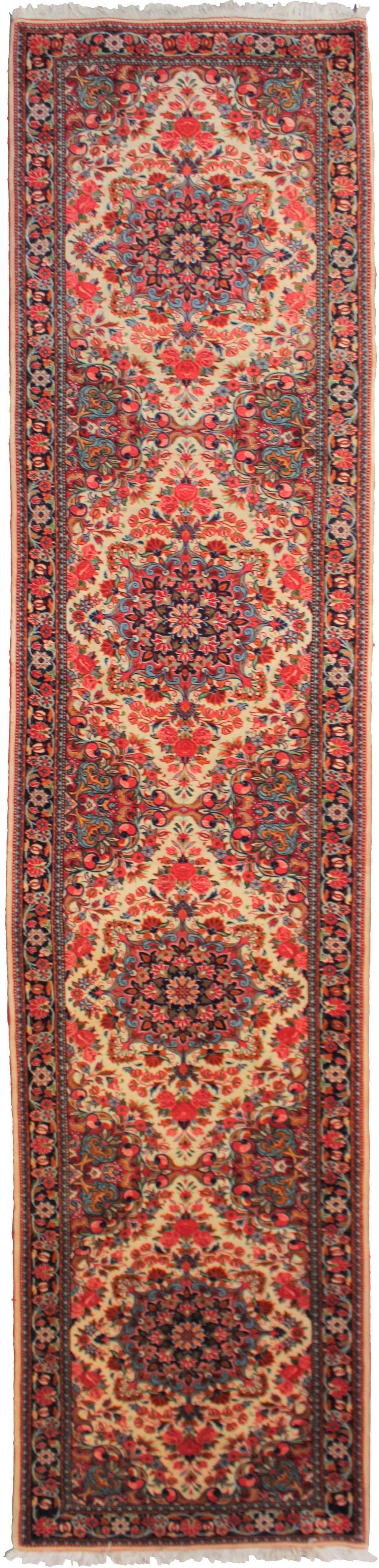 Hand-Knotted Vintage Runner. 2'5" X 10'3": This stunning Semi Antique Kirman runner was hand knotted in1950’s with 75% wool and 25% cotton dyed with natural color. This runner has very tied weaves that makes it a very strong rug which will l