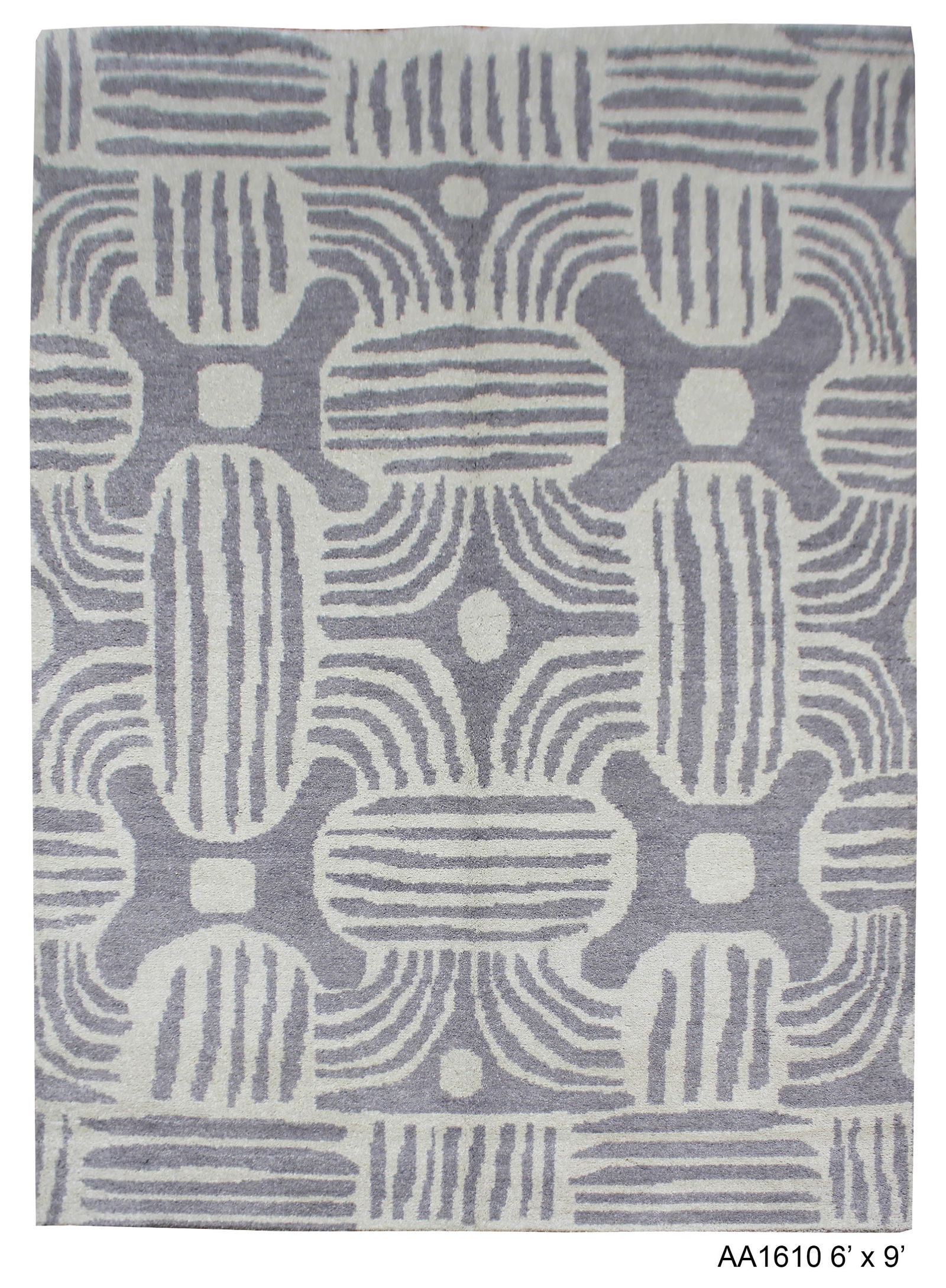 Handmade Ikat Wool Rug. 6' x 9': Hand knotted of top quality natural dyed wool and cotton in Afghanistan. This unique and innovative Ikat Rug is an eye catching example that beautifully showcases some of the finest modern design. Any
