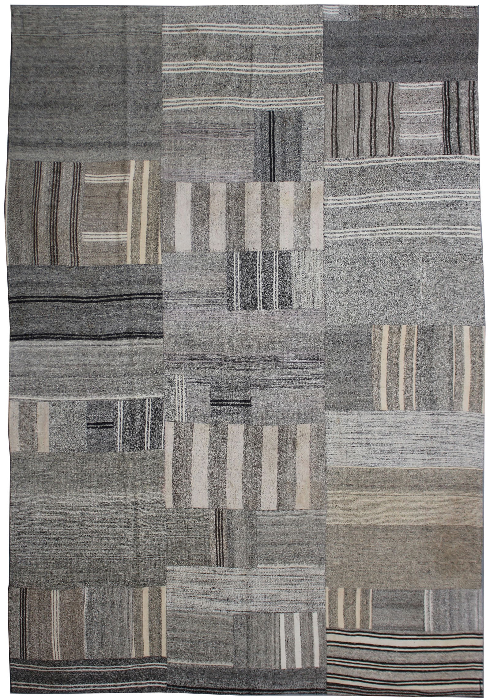 Handmade Vintage Patchwork Rug in red color. 8'3" x 10'7": A beautiful antique Patchwork Kilim. It's in very good condition, practically new. This Patchworks kilim is produced of older handwoven kilims that are about 60 years old, and have been cut in smaller