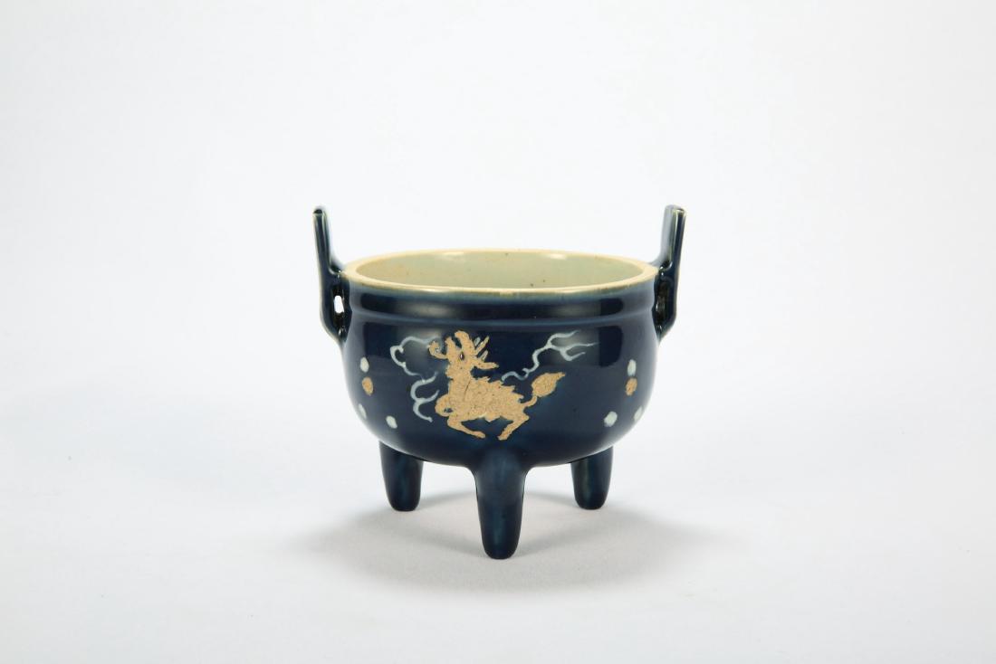 Chinese powder blue tripod porcelain incense burner.: Chinese powder blue tripod porcelain incense burner. Ht 10.5 cm.
