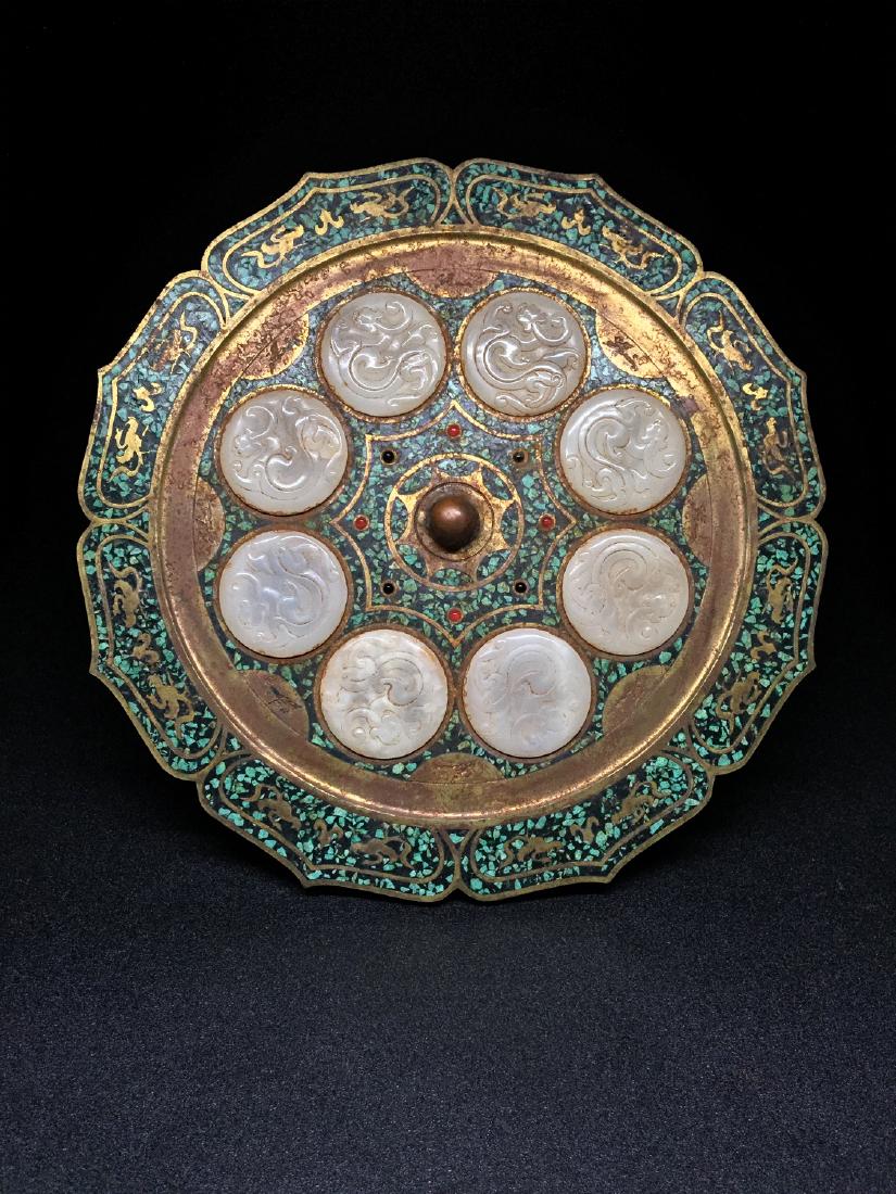 Chinese metal mirror with inlaid white jade plagues. (1 of 9)