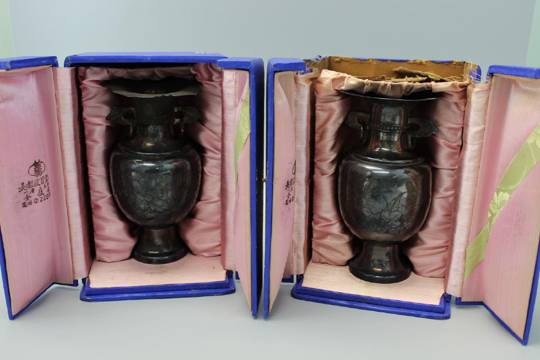 Pair of Korean silver vases. (1 of 3)