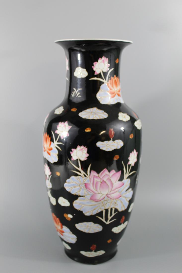 Chinese black glaze porcelain tall vase. (1 of 3)